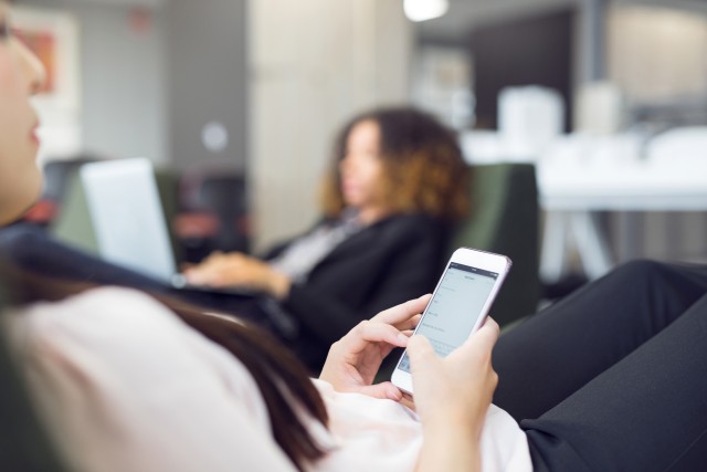 woman using iphone