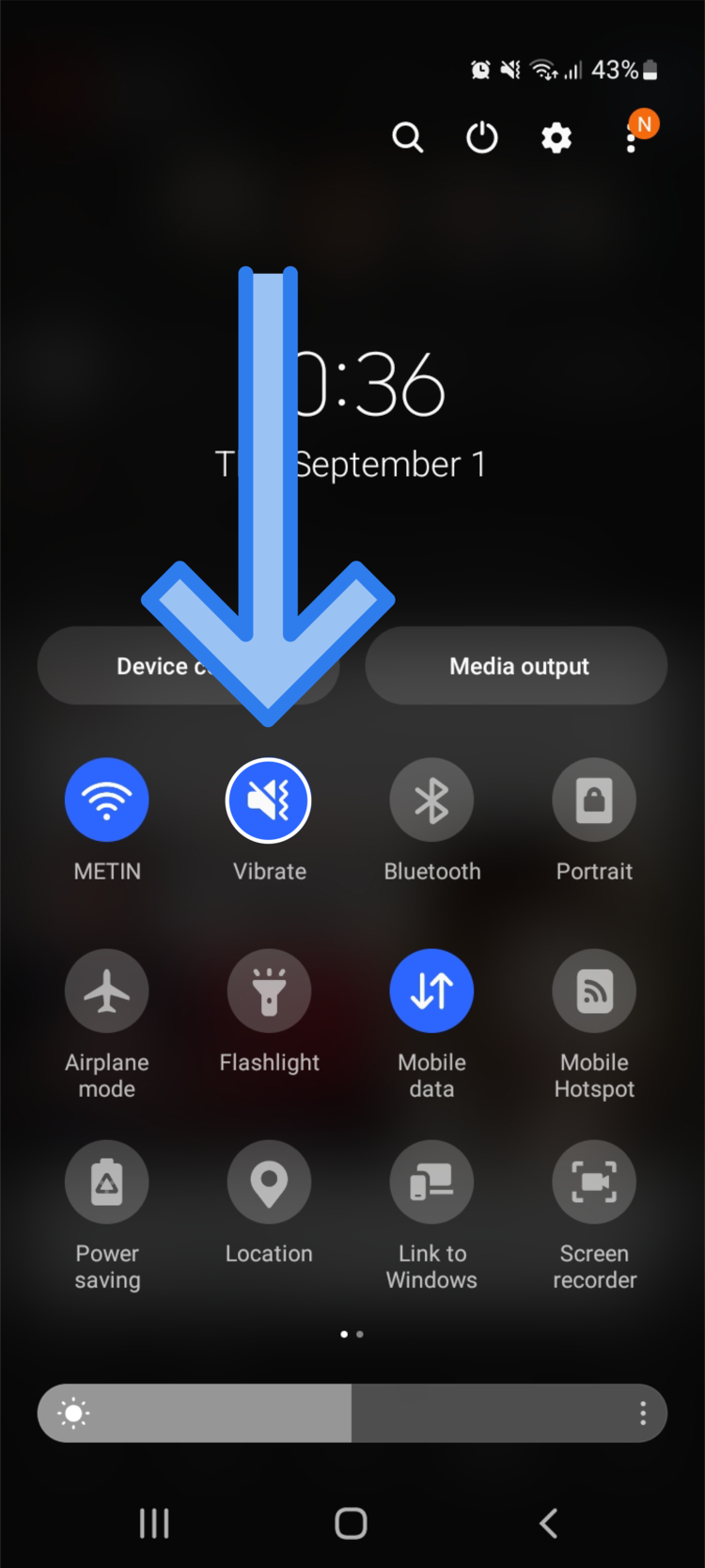 Tap on the ‘sound’ icon until it turns into the ‘vibrate mode’ icon